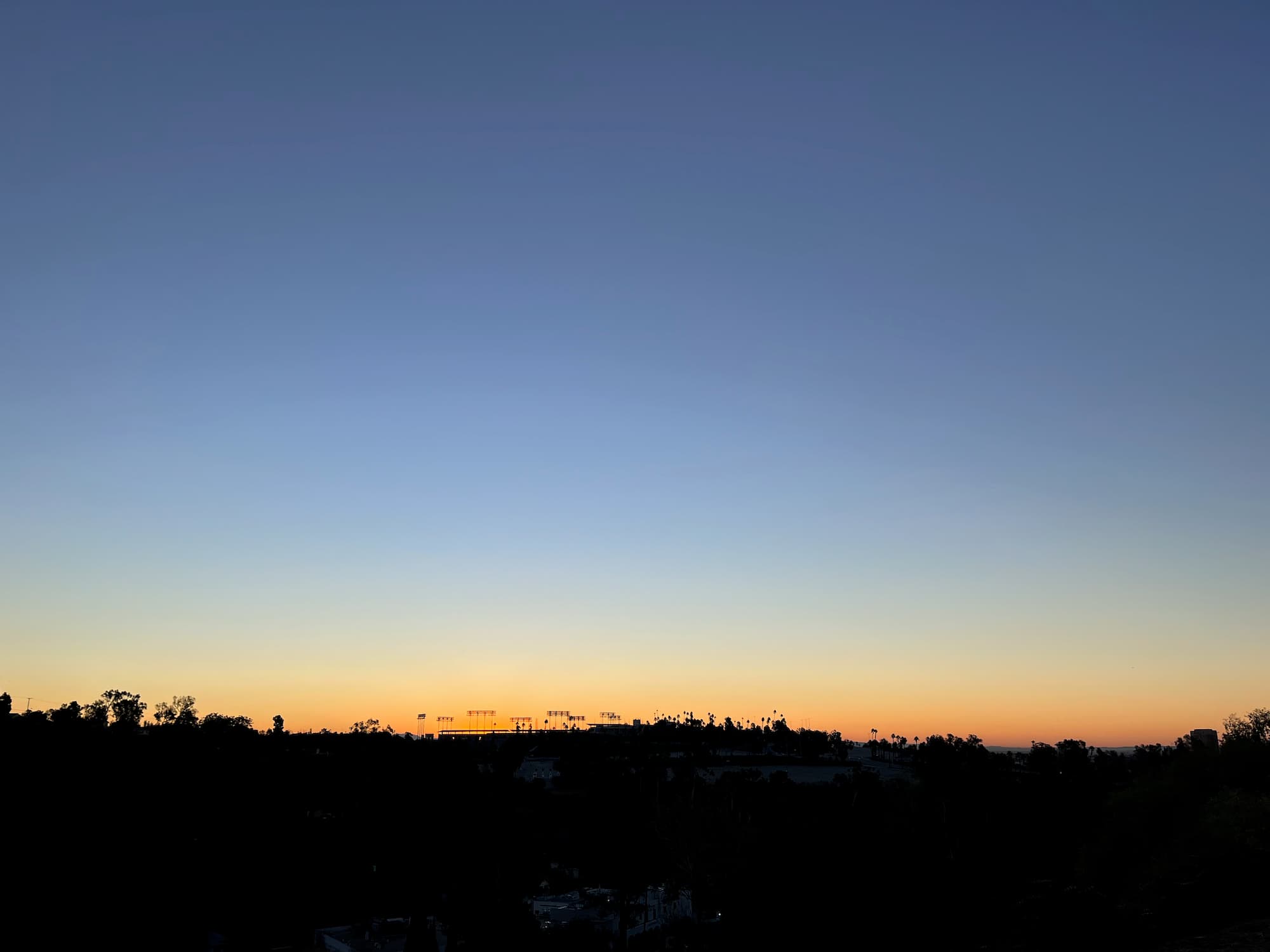 Photo by Lucas Homer Sun rises over Dodger Stadium and Elysian Park in Los Angeles